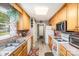 Efficient kitchen with ample cabinetry, appliances, and good layout at 215 Raleigh Nw St, Concord, NC 28027
