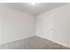 Light bedroom with soft gray carpet and standard closet at 221 Century Dr, Salisbury, NC 28147
