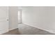 Cozy bedroom showcasing plush carpet, neutral paint, and a bright window at 221 Century Dr, Salisbury, NC 28147