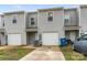 Townhome featuring a one car garage and neutral siding at 221 Century Dr, Salisbury, NC 28147