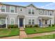 Gray siding townhome with well-maintained lawn and landscaping at 221 Century Dr, Salisbury, NC 28147
