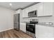 Well-equipped kitchen with stainless steel appliances and granite countertops at 221 Century Dr, Salisbury, NC 28147
