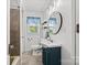 Updated bathroom with a vanity, modern fixtures, and tiled shower/tub combination at 2222 Moose Rd, Kannapolis, NC 28083