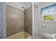 Bathroom featuring a shower and tub combination with window providing natural light at 2222 Moose Rd, Kannapolis, NC 28083