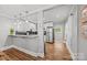 Open concept kitchen features a breakfast bar and stainless steel refrigerator at 2222 Moose Rd, Kannapolis, NC 28083