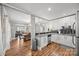 View of kitchen from dining room features open layout and granite countertops at 2222 Moose Rd, Kannapolis, NC 28083