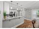 Bright kitchen featuring modern white cabinets, stainless appliances and granite counters at 2222 Moose Rd, Kannapolis, NC 28083