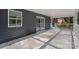 Back porch with access via sliding glass door offers a serene outdoor space for relaxation and entertaining at 2403 Mary Ave, Gastonia, NC 28052
