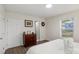 This bright bedroom features wood-look floors, neutral walls, and natural light at 2403 Mary Ave, Gastonia, NC 28052