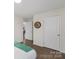 This hallway features wood-look floors and white trim at 2403 Mary Ave, Gastonia, NC 28052