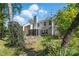 Exterior view of home with a lush backyard and green foliage at 2856 Huckleberry Hill Dr, Fort Mill, SC 29715