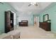 Large main bedroom features carpet, a tray ceiling, and an ensuite bathroom at 2856 Huckleberry Hill Dr, Fort Mill, SC 29715