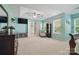 Spacious main bedroom with tray ceiling, neutral carpet, and ensuite bath access at 2856 Huckleberry Hill Dr, Fort Mill, SC 29715