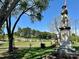 Green space with historic monuments and mature trees on a sunny day at 2856 Huckleberry Hill Dr, Fort Mill, SC 29715