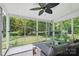 Enclosed sunroom with natural light and a view of the outdoor greenery at 2856 Huckleberry Hill Dr, Fort Mill, SC 29715