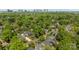 Neighborhood with lush trees and well-kept homes with the city skyline visible in the distance at 3019 Sunset Dr, Charlotte, NC 28209