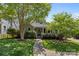 Charming bungalow with lush landscaping, inviting front porch, and a well-maintained walkway leading to the entrance at 3019 Sunset Dr, Charlotte, NC 28209