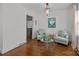 Bright sitting room with hardwood floors and stylish seating, creating a cozy and inviting atmosphere at 3019 Sunset Dr, Charlotte, NC 28209