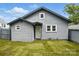 Charming home with gray horizontal siding, trimmed windows, and a tidy front lawn at 313 Mayflower Ave, Cramerton, NC 28032