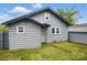 Cozy single-story home featuring gray siding, well-maintained lawn, and inviting front door at 313 Mayflower Ave, Cramerton, NC 28032