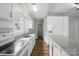 Bright kitchen with granite countertops, stainless appliances and ample storage at 313 Mayflower Ave, Cramerton, NC 28032