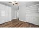 Spacious kitchenette with modern, white cabinetry, updated countertop, and wood-look floors at 313 Mayflower Ave, Cramerton, NC 28032