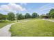 Scenic park view with walking path and covered shelter, perfect for outdoor enjoyment at 313 Mayflower Ave, Cramerton, NC 28032