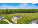 Expansive fenced yard surrounds this home with an attached garage and covered front porch at 3659 Kimber Ln, Sherrills Ford, NC 28673