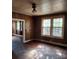 Sunlit living room with hardwood floors and windows offering ample natural light at 40 Ranlo Ave, Gastonia, NC 28054