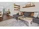 Comfortable living room featuring a sectional sofa, decorative shelves, and modern décor at 402 Sidney Johnson St, Fort Mill, SC 29715