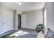 Bedroom with multiple doors, chair and hardwood style flooring at 430 Coolidge Ave, Statesville, NC 28677