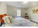 Bedroom with a large bed, an area rug, and side table at 430 Coolidge Ave, Statesville, NC 28677
