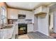 Bright kitchen featuring white cabinets, stainless steel appliances, and stylish granite countertops at 430 Coolidge Ave, Statesville, NC 28677