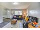 Spacious living room with dual seating, stylish decor, and ample natural light at 430 Coolidge Ave, Statesville, NC 28677