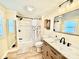 Updated bathroom with modern vanity, shower, and new fixtures at 45 Oak St, Great Falls, SC 29055