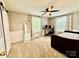 Bright bedroom featuring neutral paint, two windows and carpet at 45 Oak St, Great Falls, SC 29055