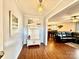 Inviting entryway with a stylish hall tree and views into the open-concept living spaces at 45 Oak St, Great Falls, SC 29055
