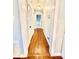 Hallway featuring hard wood floors that extend from one room into another space at 45 Oak St, Great Falls, SC 29055