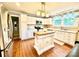 Bright kitchen featuring a center island, stainless steel appliances, and ample cabinet space at 45 Oak St, Great Falls, SC 29055