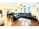 Spacious living room with hardwood floors, a ceiling fan, and a view into the open kitchen at 45 Oak St, Great Falls, SC 29055