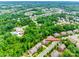Beautiful aerial view of a neighborhood with lush landscaping, a community pool, and clubhouse at 4711 Pearmain Dr, Waxhaw, NC 28173