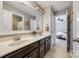 Bright bathroom with double sink vanity and neutral tones creates a functional and stylish space at 4711 Pearmain Dr, Waxhaw, NC 28173