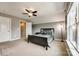 Cozy bedroom with carpet, ceiling fan, and neutral walls creates a comfortable and inviting space at 4711 Pearmain Dr, Waxhaw, NC 28173