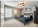 Bedroom with neutral colors, carpet, and large window at 4711 Pearmain Dr, Waxhaw, NC 28173