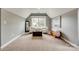 Bright bedroom with neutral colors, carpet, and natural light from a large window at 4711 Pearmain Dr, Waxhaw, NC 28173