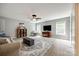 Spacious living room with large windows and carpet floors provides ample natural light and comfort at 4711 Pearmain Dr, Waxhaw, NC 28173