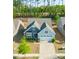 Aerial view of a well-maintained single-Gathering home with a two-car garage and neatly kept landscaping at 529 Cellini Pl # 243, Mount Holly, NC 28120