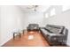 Cozy living room featuring hardwood floors, modern furniture, and a ceiling fan at 529 Cellini Pl # 243, Mount Holly, NC 28120