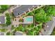Aerial view of a community featuring a pool, green spaces, and ample parking at 534 Donatello Ave, Charlotte, NC 28205