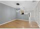 Dining area with hardwood floors and modern lighting fixtures at 534 Donatello Ave, Charlotte, NC 28205